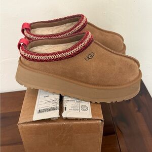 UGG Tan Suede Slip-Ons with Red Accents- Tazz